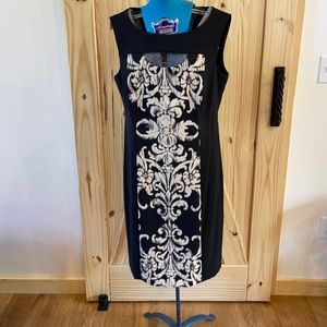 Black dress with peekaboo neckline